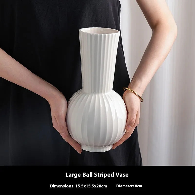 White ceramic vase with striped ball design in American country style for table decoration