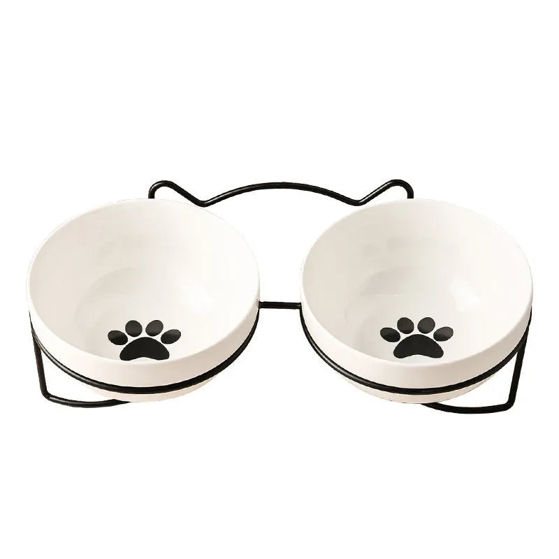 White ceramic cat bowl with decorative pattern on iron frame with cat ear accents