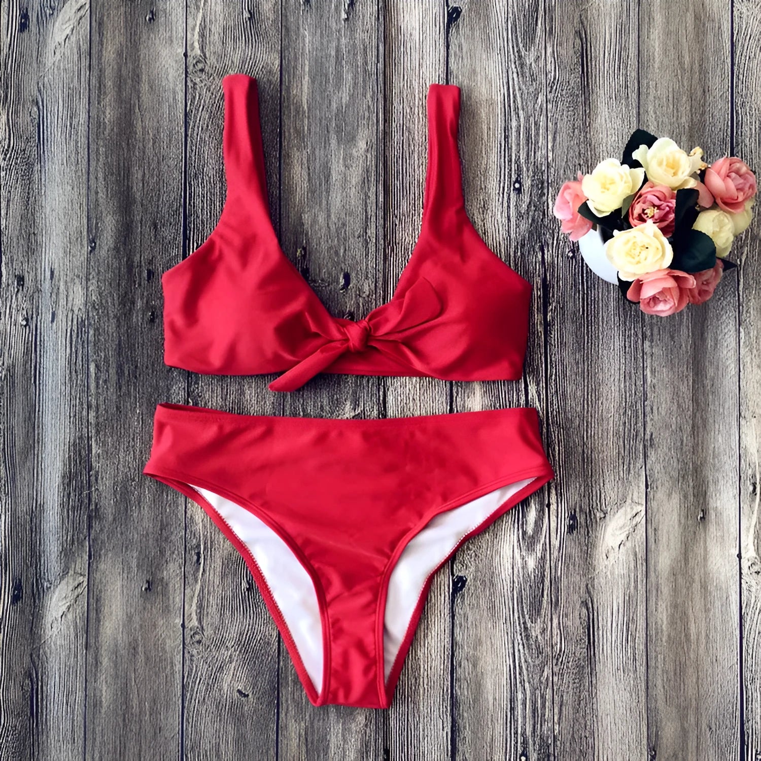 Women's solid colour bikini swimsuit set with matching bra top and bottom in polyester fabric
