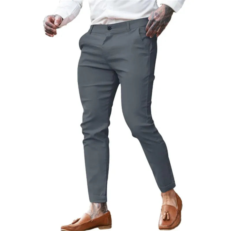 Men's slim-fit cotton stretch pencil pants in twill fabric showing high elasticity and pencil silhouette