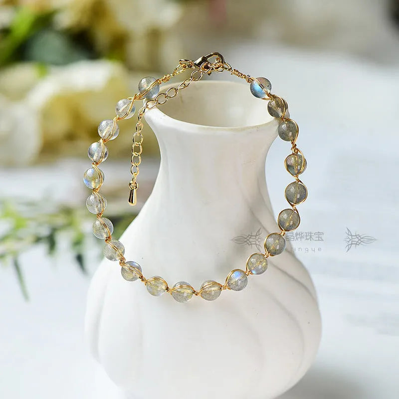 14K gilded women's bracelet with 6mm blue moonstone centrepiece and starry sky metal detailing