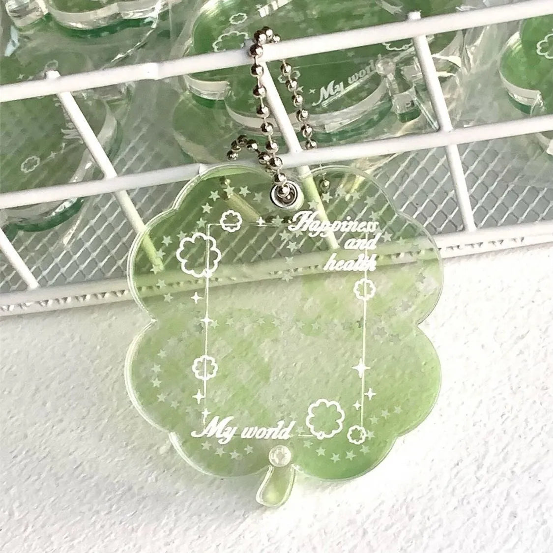 Acrylic four-leaf clover phone pendant keychain in blue, green and mint colours