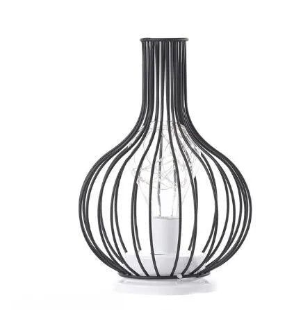 Minimalist hollow iron table lamp in wine bottle design with warm white LED lighting