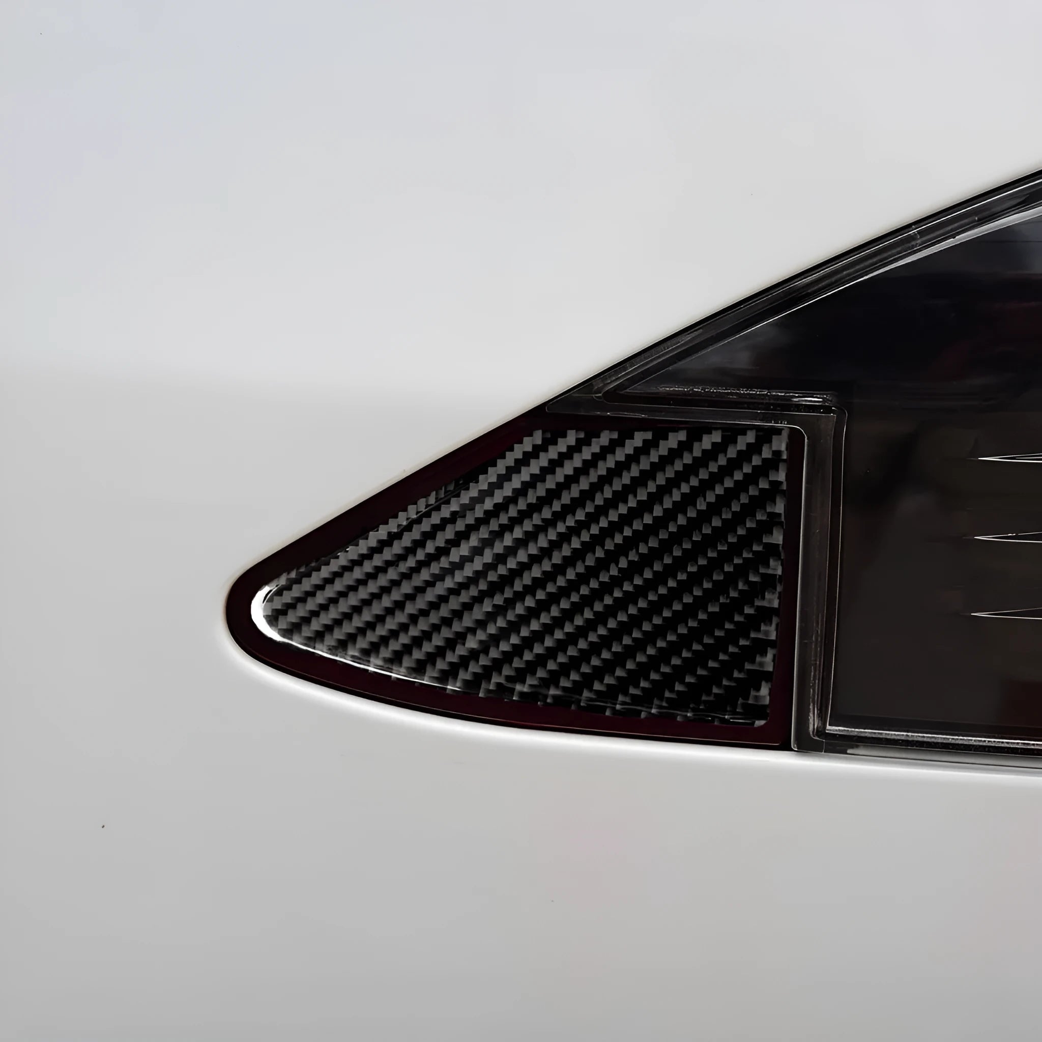 Carbon fibre USB charging port decorative sticker panel with adhesive backing