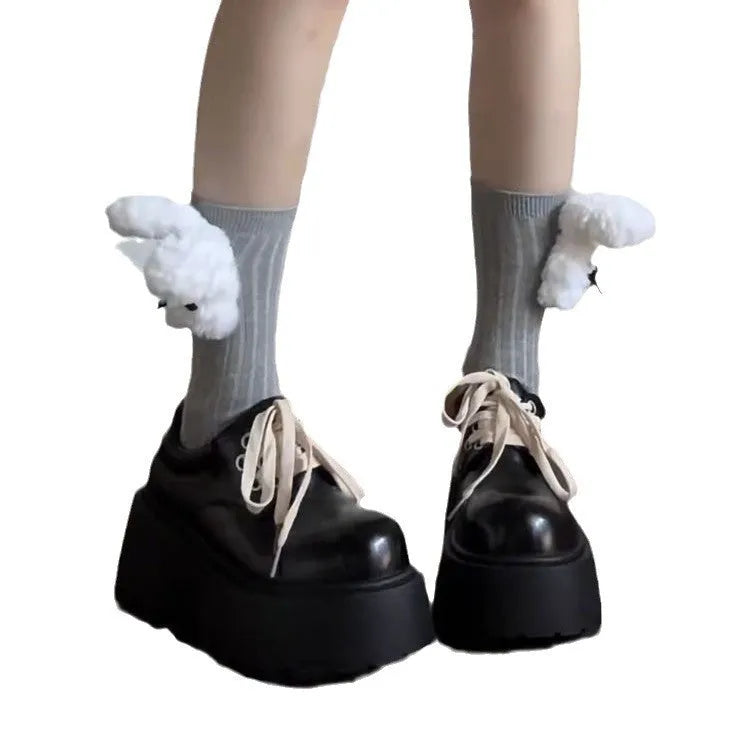 Matte black women's lace-up ankle boots with a chunky heel and thick sole.