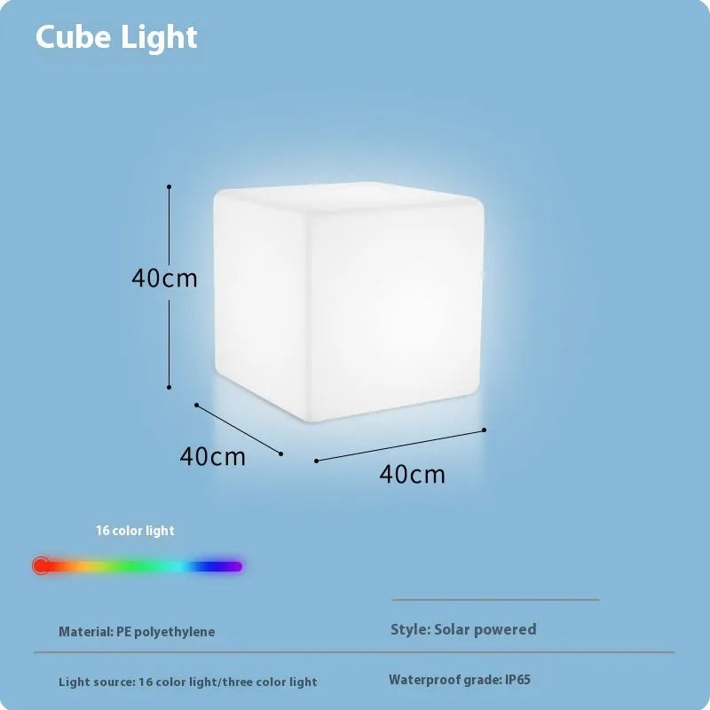 Modern square white LED cube stool light for garden patio with solar panel on top.