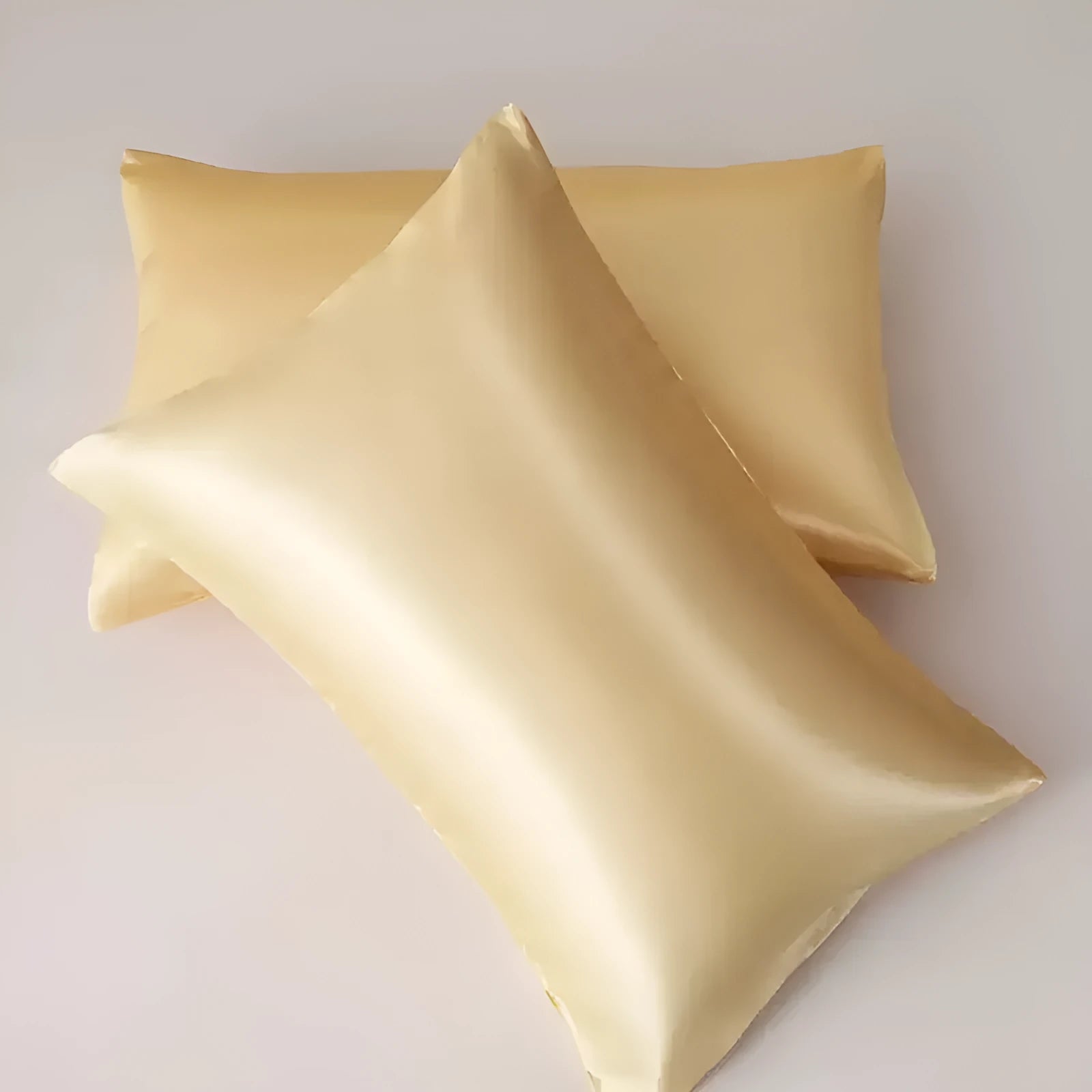A pair of solid colour satin pillowcases in a choice of thirteen colours and four sizes.