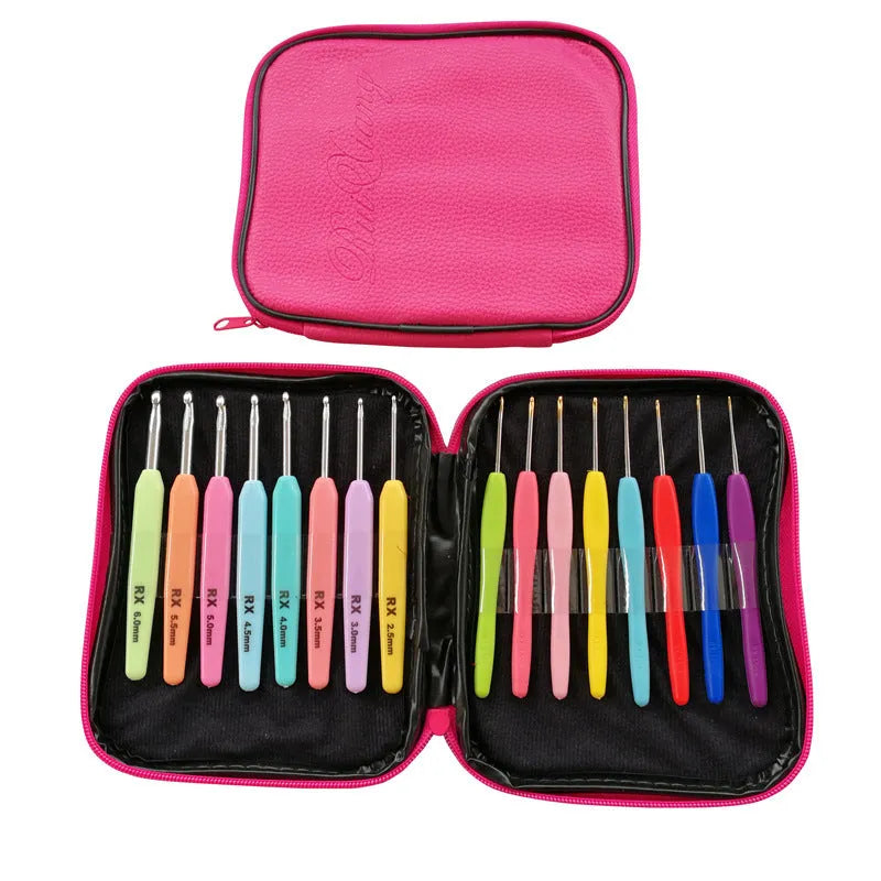 Set of 16 crochet hooks in various sizes with two handle types, laid next to a grey PU storage bag.