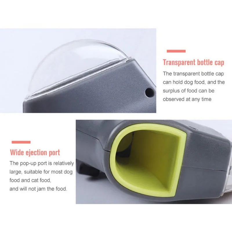 Grey plastic pet snack catapult launcher toy with a handle for dogs and cats.