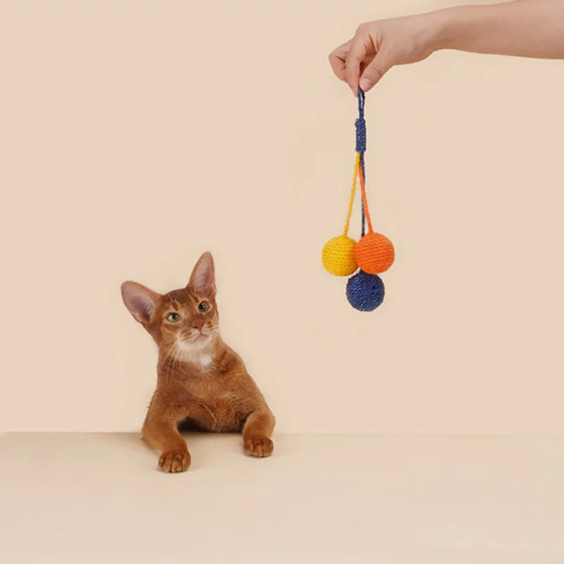 Cat teaser stick toy with catnip ball attachment, 255mm long with feather end.