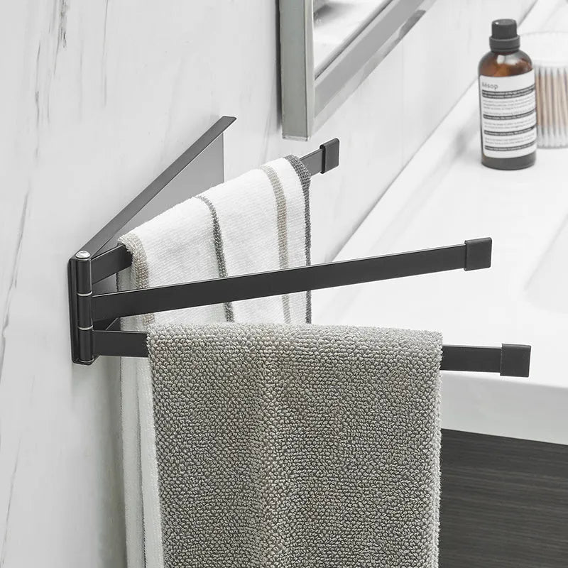 Black folding towel bar with adhesive installation for bathroom use