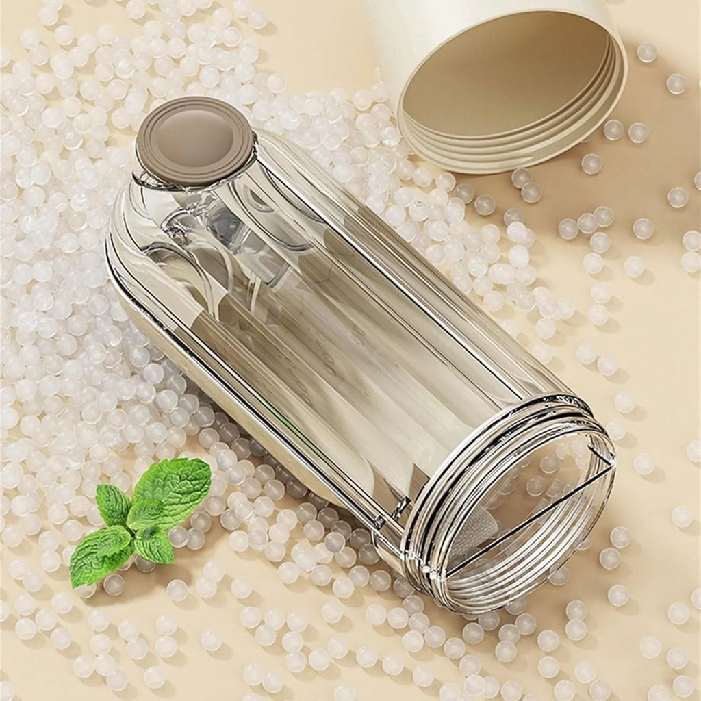 Beige and green foldable dog water bottle with food dispenser shown collapsed and open.