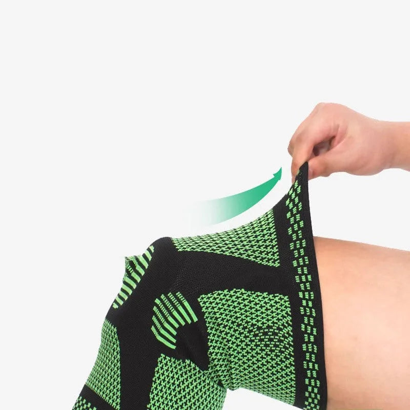 Sports fitness silicone spring knee pad in blue, shown on a leg.