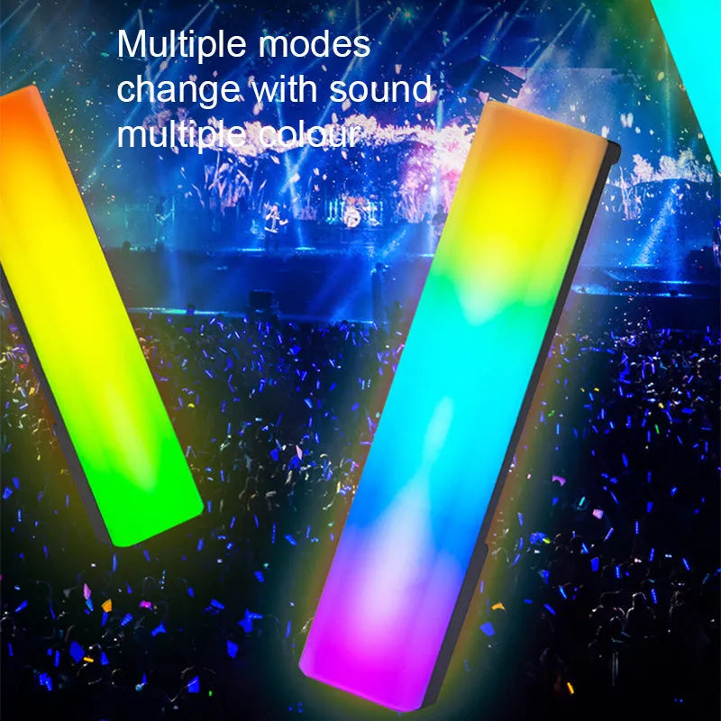 3D RGB voice-activated table top ambiance lamp in white or black shell with USB cable.