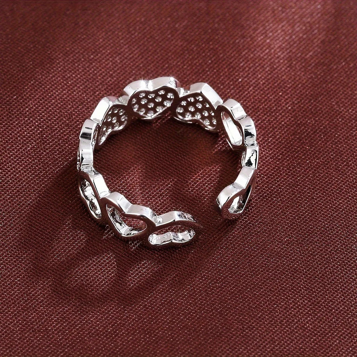 Adjustable opening copper couple ring with geometric heart design in gold and silver colour options