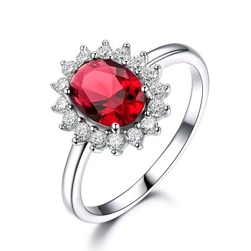 Copper electroplated women's ring with floral zirconium centre stone in blue, green, or red