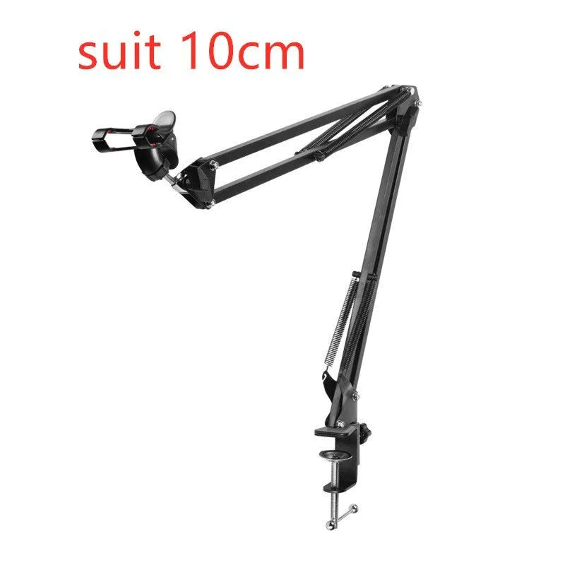 Black adjustable phone tablet stand with 360-degree rotation on wooden table