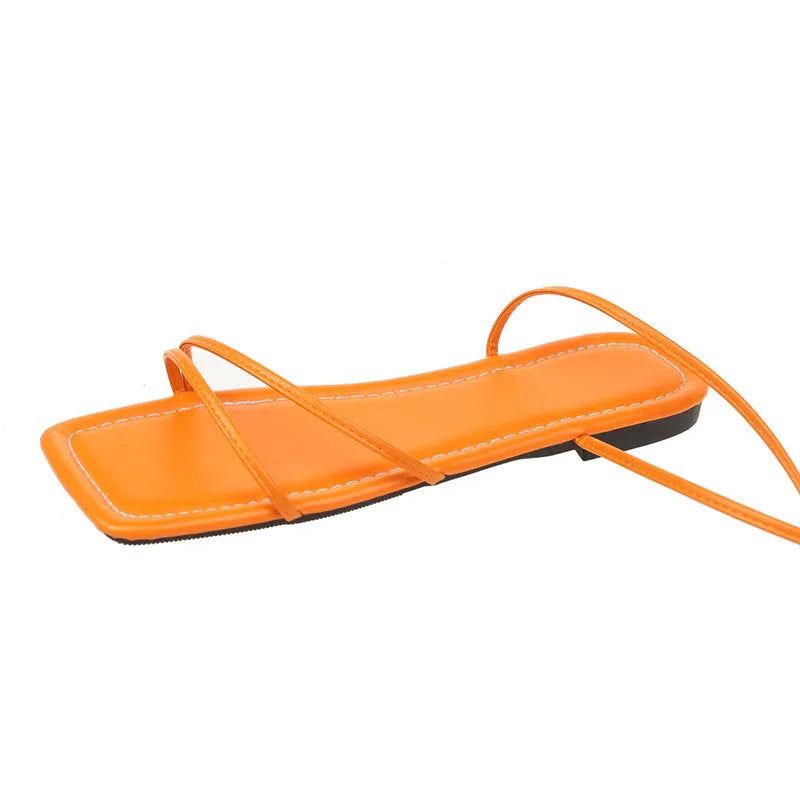 Women's flat sandals with ankle bandage detail and front lace-up in three colour options