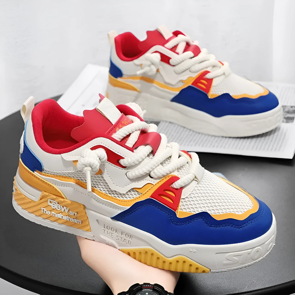 Men's white low-top board shoes with colour-matched details and rubber soles