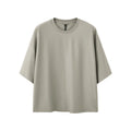 Men's sand grey loose fit short sleeve t-shirt showing cotton-polyester fabric texture