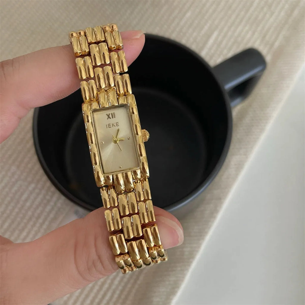Women's silver and gold bracelet-style analogue watches with 15mm dials and butterfly clasps