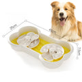 Large green three-tier slow feeder dog bowl with puzzle patterns and suction cup base