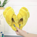 Cross open-toe fur slippers in pink with textured fur and patterned anti-slip sole.