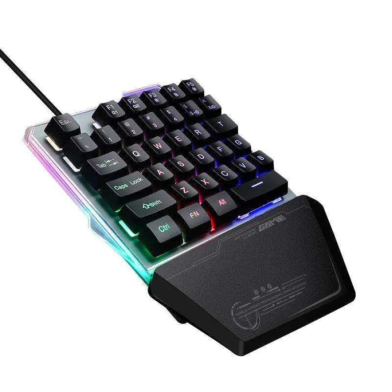 Black G40 one-handed mechanical keyboard with RGB backlighting on a desk.