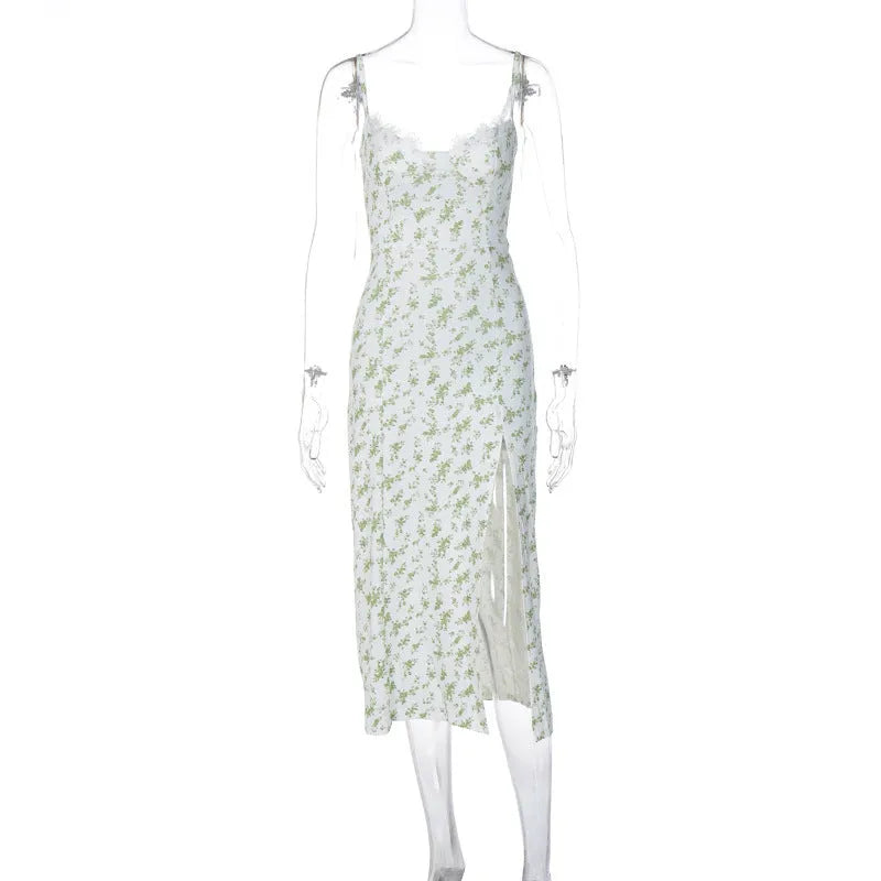Blue lace flower print long dress with thin suspender straps and a front slit.
