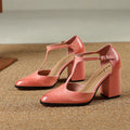 Women's retro pointed toe Mary Jane shoes with buckle and hollow baotou design in pink or dark brown.