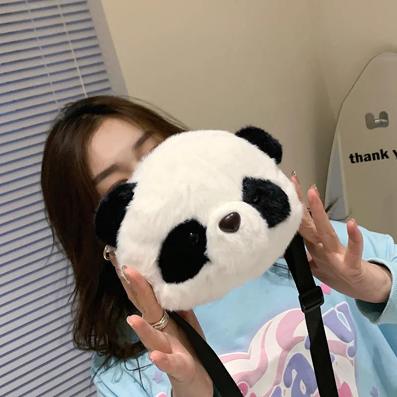 Soft plush crossbody shoulder bag with panda head design, cylindrical shape measuring 18cm