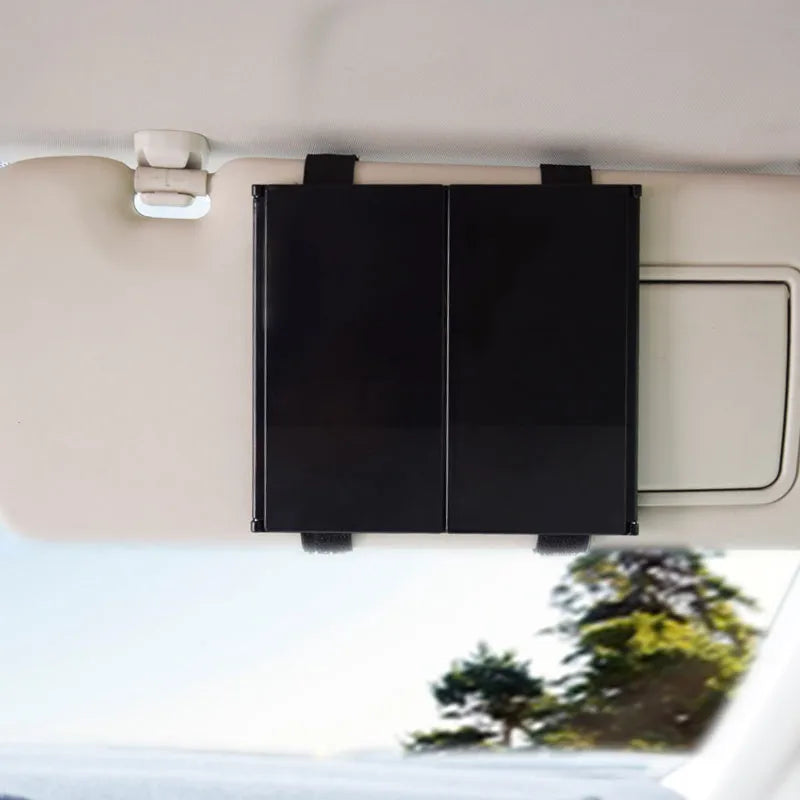 Silver car folding makeup mirror shown in both closed 15.5cm width and opened 30.5cm width positions