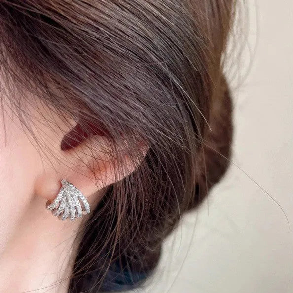 Pair of women's geometric linear earrings with a platinum electroplated finish
