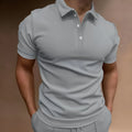 Men's loose fit cotton blend button t-shirt in multiple colours on a size chart background