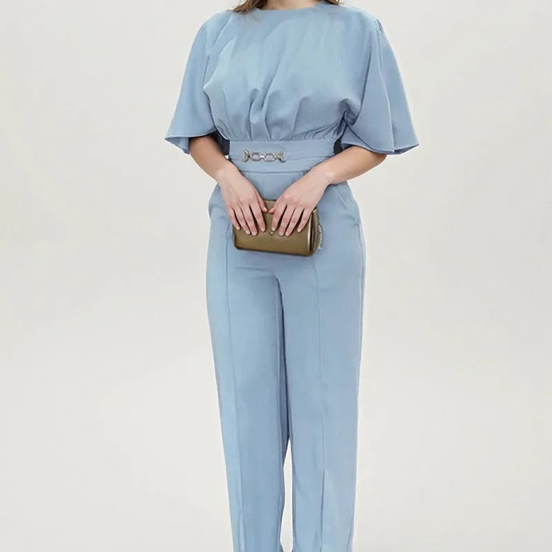 Blue men's polyester suit with trousers and long-sleeved shirt on hanger