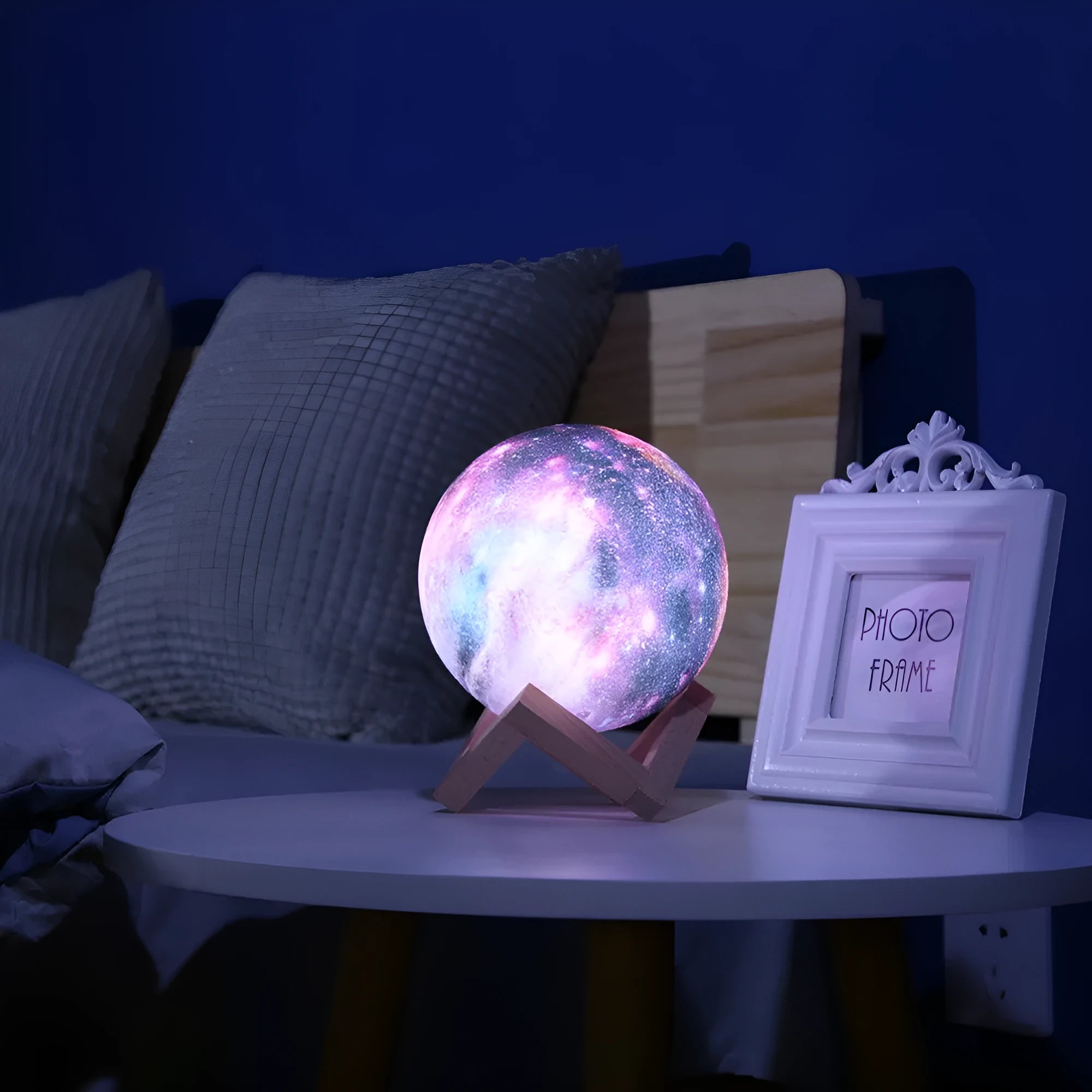 3D printed spherical lunar night light with colour changing LEDs and touch control.