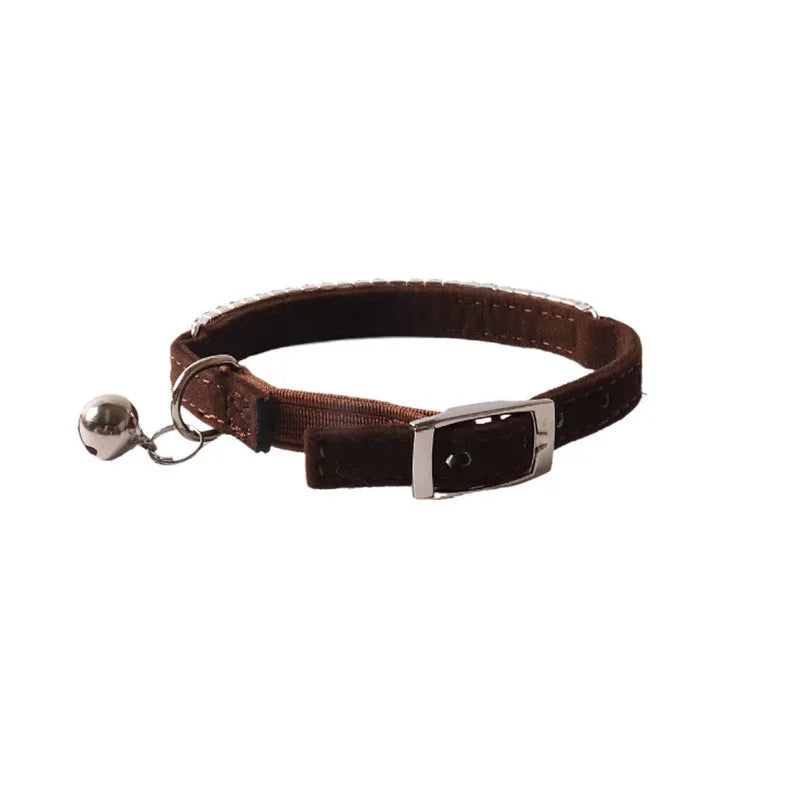 Flocked elastic buckle cat collar with drill decoration in assorted colours.