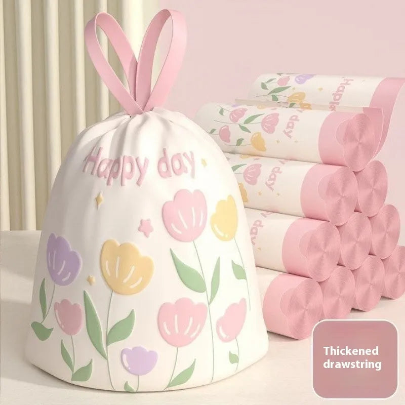 Pink degradable garbage bag with bold drawstring, scented with argy wormwood for mosquito repellent, size 44cm by 48cm.
