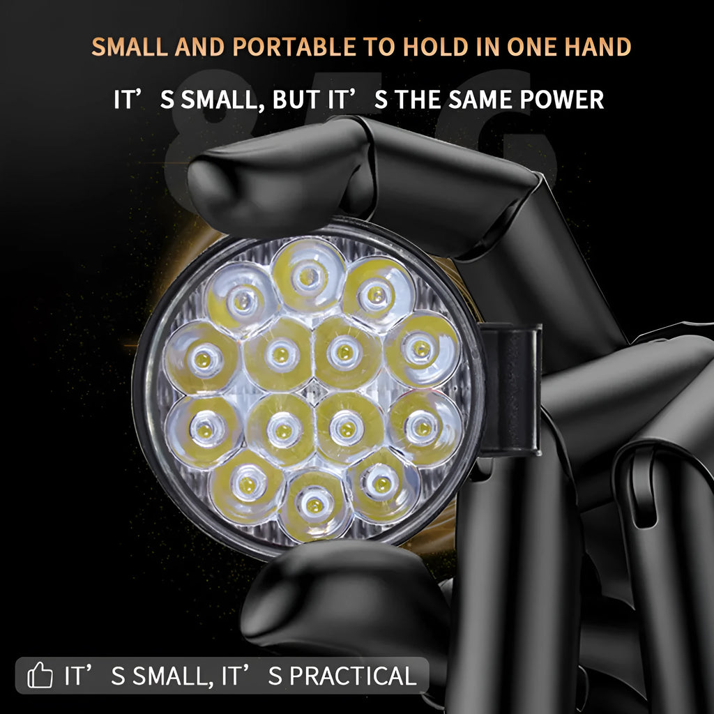 Compact round white LED work light with aluminium housing, suitable for mounting on a vehicle.