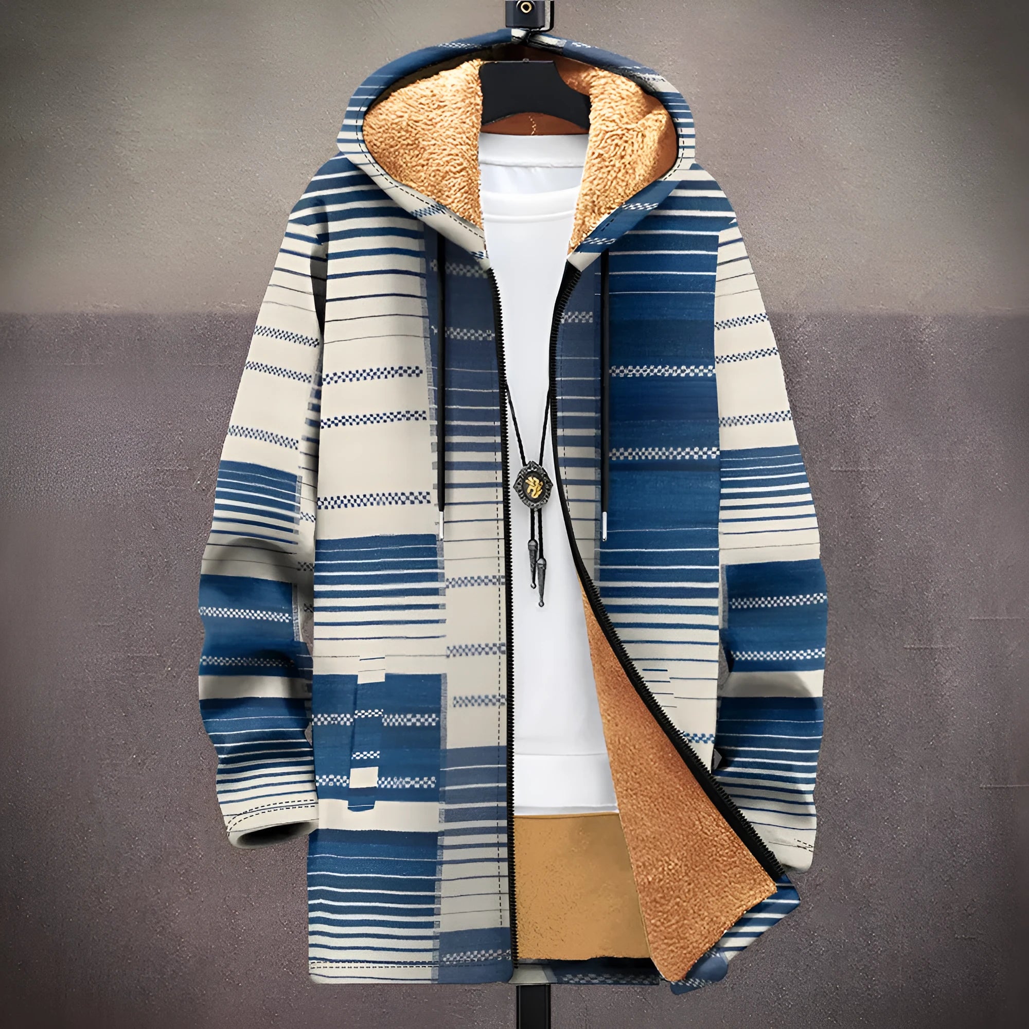 Man wearing a multicolour patterned zip-up hooded cardigan in a loose casual fit.
