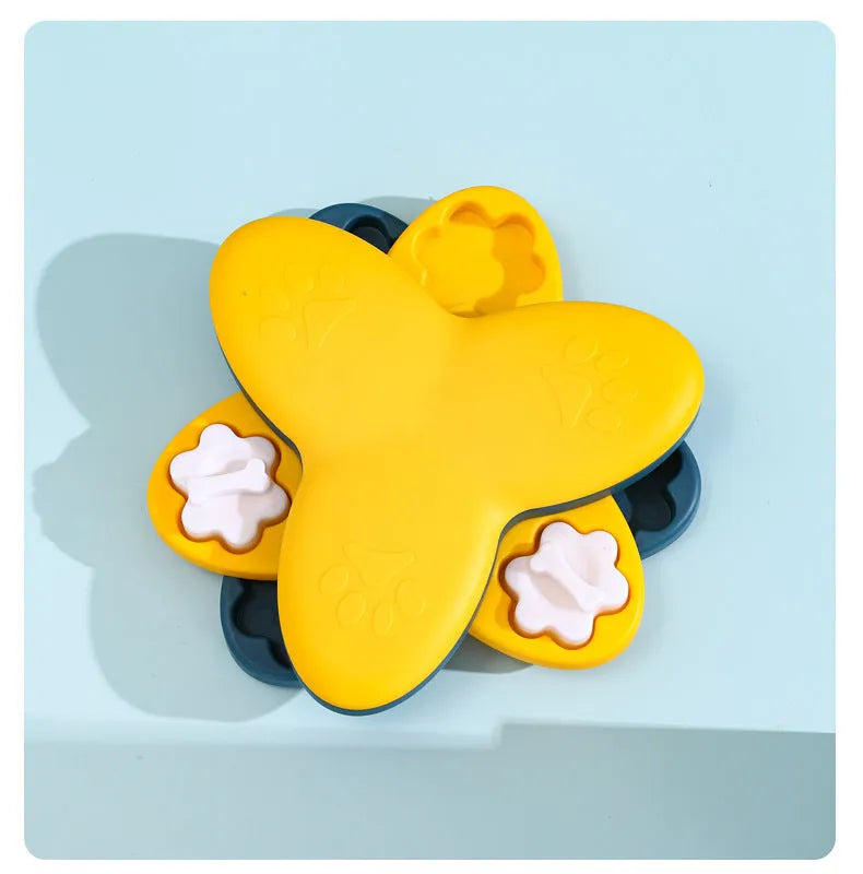 Green interactive dog puzzle bowl with bone-shaped covers on a non-slip base.