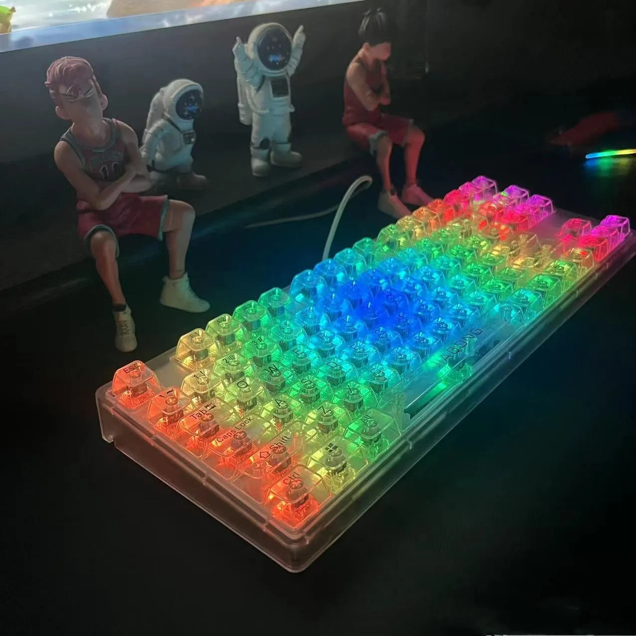 132 transparent plastic mechanical keyboard key caps laid out in grid pattern
