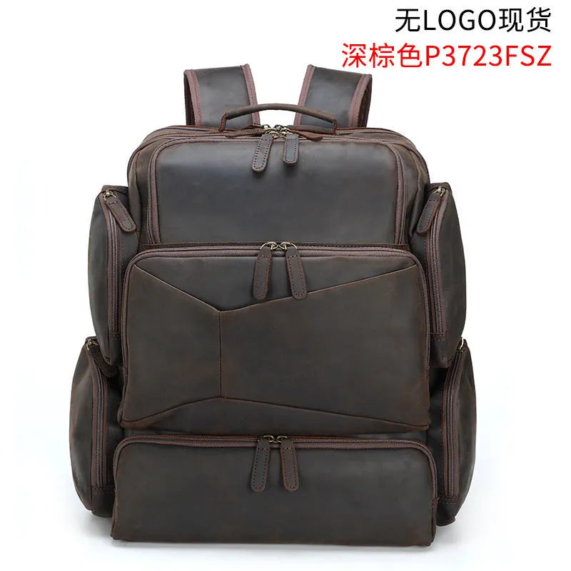 Dark brown leather backpack for 17-inch laptops with multiple compartments and shoulder straps