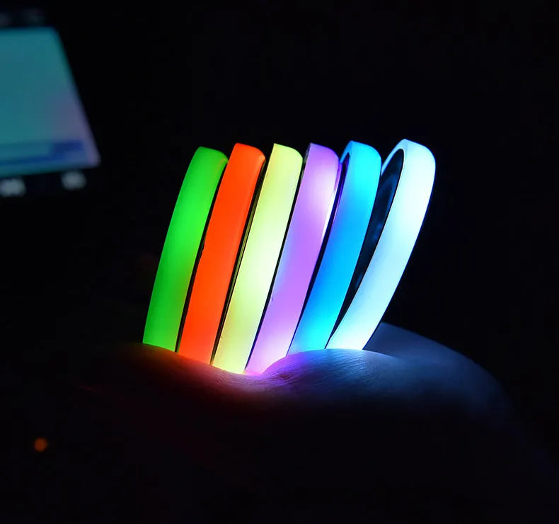 LED light-up car coaster showing seven colour options in automotive cup holder