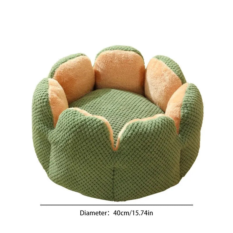 Green cactus petal shaped enclosed pet bed for cats and dogs on a hardwood floor.