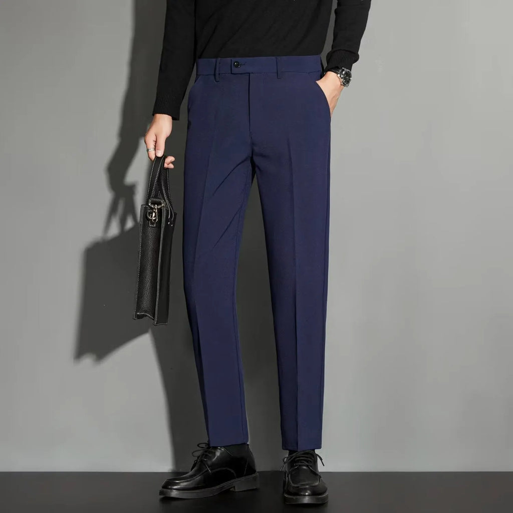 Men's straight cut suit trousers with ankle-length finishing in polyester blend fabric