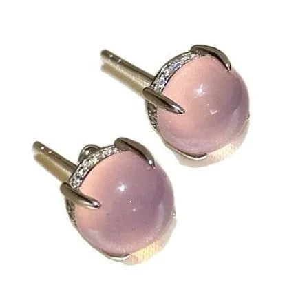 Chinese style chalcedony stud earrings with round egg surface stones in four claw settings