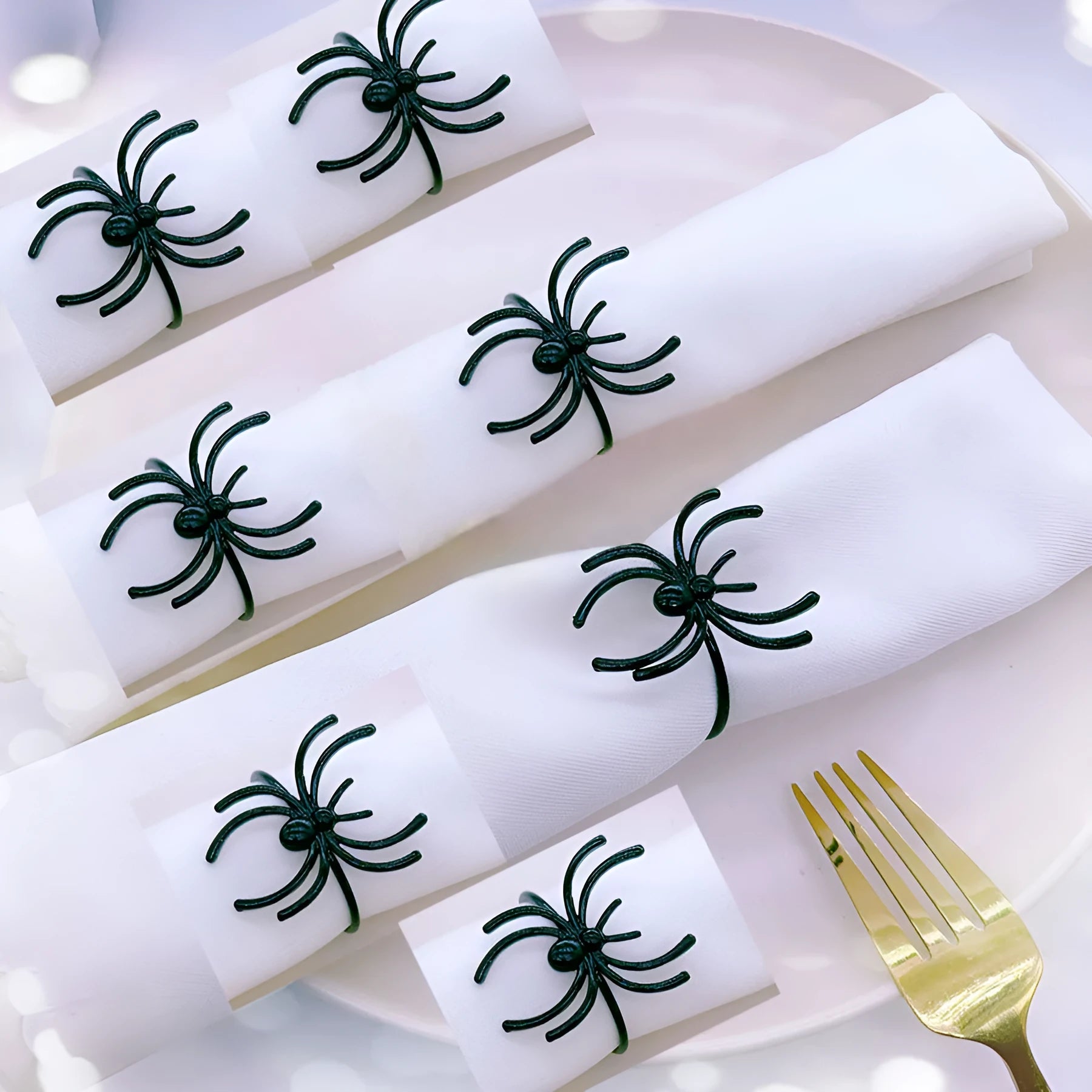 Six black spider alloy napkin rings for Halloween table decorations measuring 5x4.5x4cm