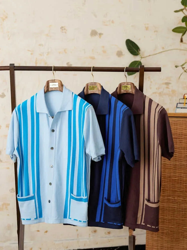 Short-sleeved striped knit cardigan polo shirt with a lapel collar, shown in a light blue colour.