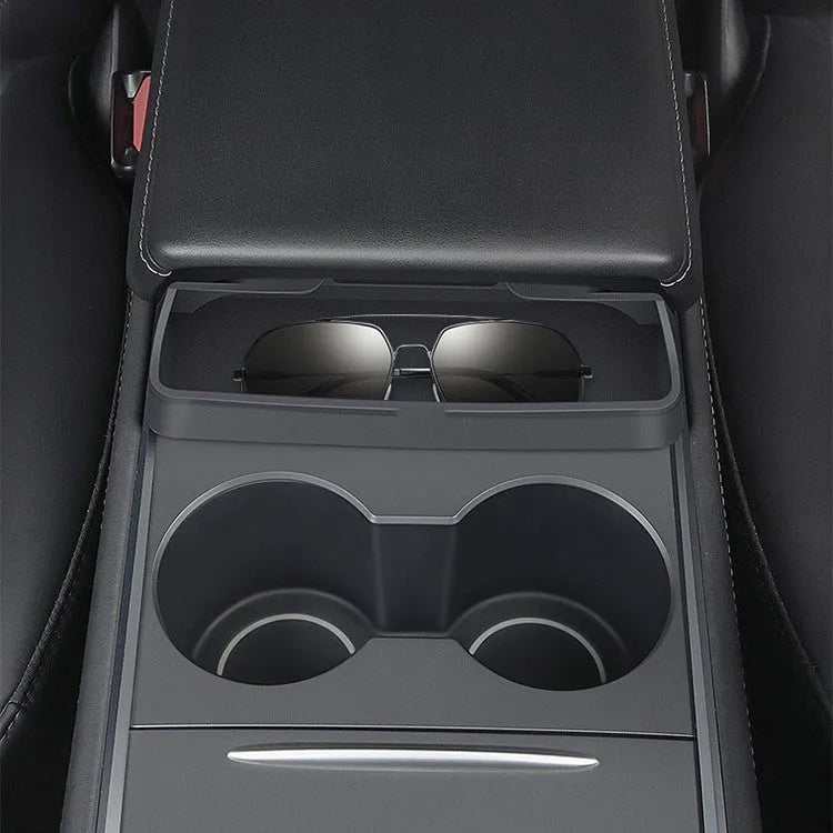 Black silicone glasses case installed in Tesla Model 3/Y centre console armrest compartment